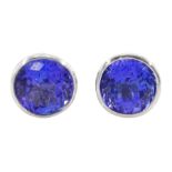 Pair of platinum bezel set round cut tanzanite