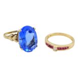14ct gold channel set ruby and diamond ring and a 9ct gold blue paste stone ring