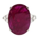 18ct white gold oval cut ruby and round brilliant cut diamond ring