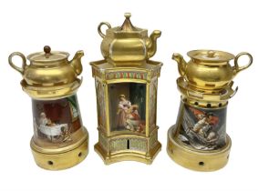 Three 19th century continental teapots and warmers