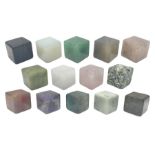 Fourteen cube mineral specimens