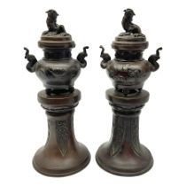Pair of Oriental brass twin-handled incense burners