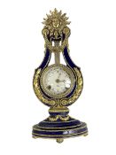 20th century V&A Marie Antionette lyre clock - Blue porcelain with gilt mounts on a oval stepped ba