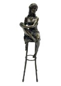 Art Deco style bronze modelled as a female figure seated upon a chair