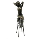 Art Deco style bronze modelled as a female figure seated upon a chair