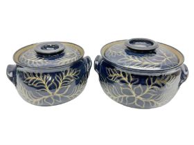 John Egerton (c1945-): set of two studio pottery stoneware twin handled jars with covers