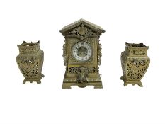 French- early 20th century 8-day brass cased eight-day mantel clock and pair of pierced brass vases
