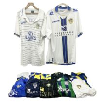 Leeds United football club - thirteen replica shirts including home and away