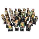 Twenty four Royal Doulton figures of characters from the works of Charles Dickens