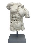 Composite sculpture of a Classical male torso on a stand