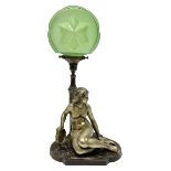 Art Deco style bronzed and gilded spelter figural table lamp with green Uranium glass shade; H48cm
