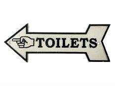 Cast iron Toilets sign in the shape of an arrow