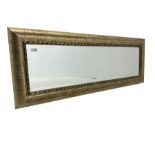 Rectangular wall mirror in gilt famed