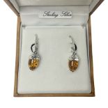 Pair of silver and Baltic amber acorn pendant earrings