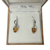 Pair of silver and Baltic amber acorn pendant earrings