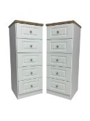 Pair of tall narrow oak and white finish five drawer pedestal chests
