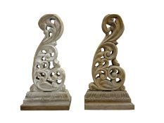 Pair of carved beech table end supports