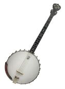 Deering seventeen-fret tenor banjo with cast metal body