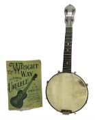 George Formby banjolele with metal plaque to headstock L55cm; in carrying case with instruction book