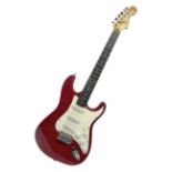 1990s Korean Squier Fender Stratocaster electric guitar in cherry red; serial no.S965951