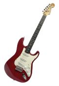 1990s Korean Squier Fender Stratocaster electric guitar in cherry red; serial no.S965951