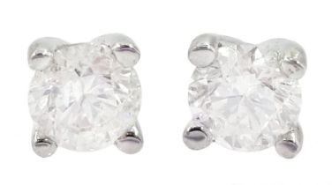 Pair of 18ct white gold round brilliant cut diamond stud earrings