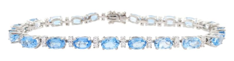 18ct white gold oval aquamarine and round brilliant cut diamond bracelet