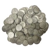 Approximately 740 grams of Great British pre 1947 silver one shilling coins