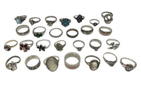 Twenty seven silver and silver-gilt stone set rings