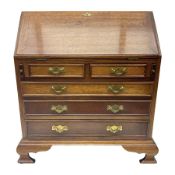 Mahogany table cabinet modelled as a miniature George III style fall-front bureau with ogee bracket