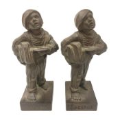 Pair of cast iron Qualcast advertising figures of news boys marked 'Speshul'
