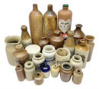 Julius Peters Hull stoneware bottle and a collection of other stoneware advertising bottles