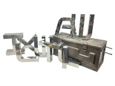 Ten industrial style metal letters