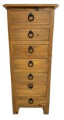 Solid pine seven drawer pedestal chest