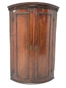 George III oak cylinder corner cupboard