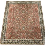 Large Persian design red ground rug