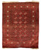Antique Persian crimson ground rug