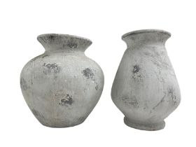 Two composite Grecian design urns or pots