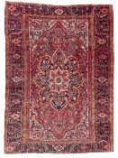 Antique Persian coral ground carpet