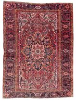 Antique Persian coral ground carpet