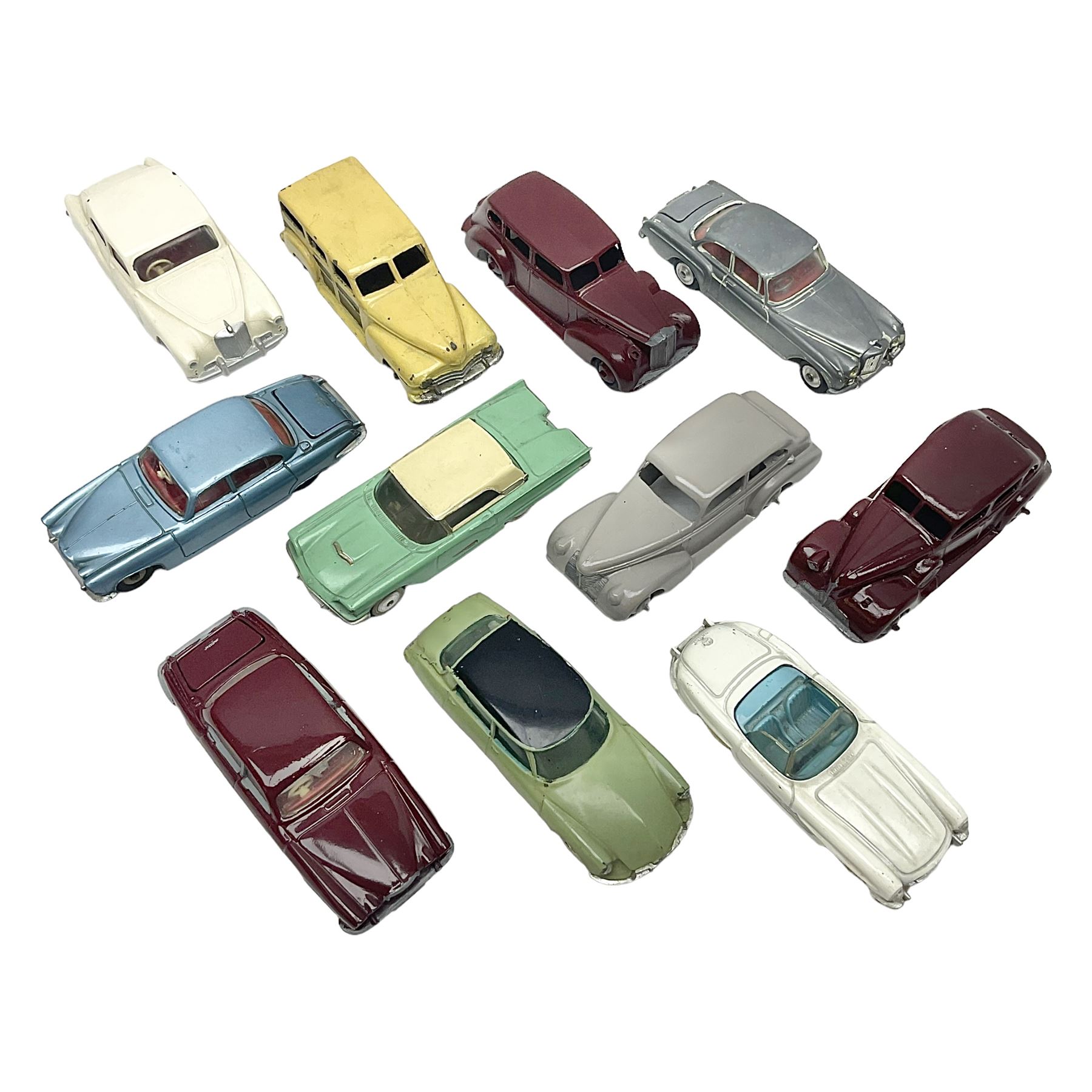 Eleven unboxed and playworn early die-cast models including Dinky Packard