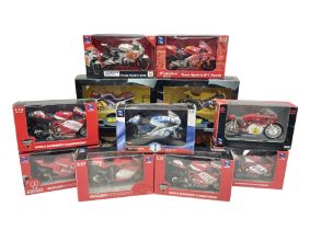 Nine NewRay 1:12 scale die-cast models of motorcycles including Ducati