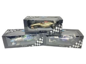 Three Minichamps '18' 1:18 scale die-cast racing cars - Jordan Peugeot 196 1996 R. Barrichello; Bene
