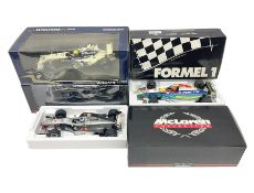 Four Minichamps 1:18 scale die-cast racing cars - Williams F1 Team BMW FW26 R. Schumacher; McLaren M