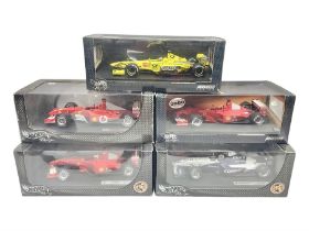 Five Mattel Hot Wheels 1:18 scale die-cast racing cars - Ferrari F1-2000 Michael Schumacher; Ferrari