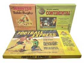 Subbuteo - three boxed sets comprising Football Express with two five-a-side teams and floodlighting