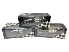 Three Minichamps 1:18 scale die-cast McLaren racing cars - Mercedes MP4-19 D. Coulthard; Mercedes MP