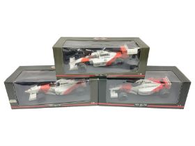 Three Paul's Model Art 1:18 scale die-cast McLaren racing cars - Mercedes MP4/11 D. Coulthard; MP4/4
