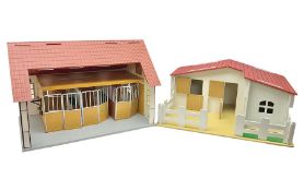 Sectional wooden horse stables playset by Julip with two stalls and tack room under a pitched roof