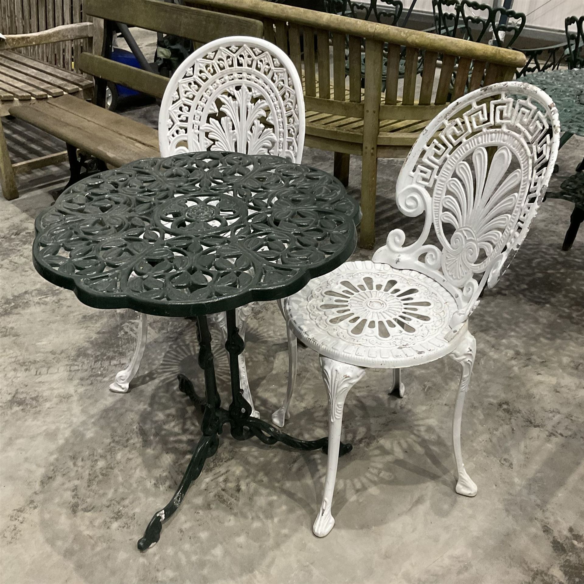 Cast aluminium green painter garden table and white painted chairs
